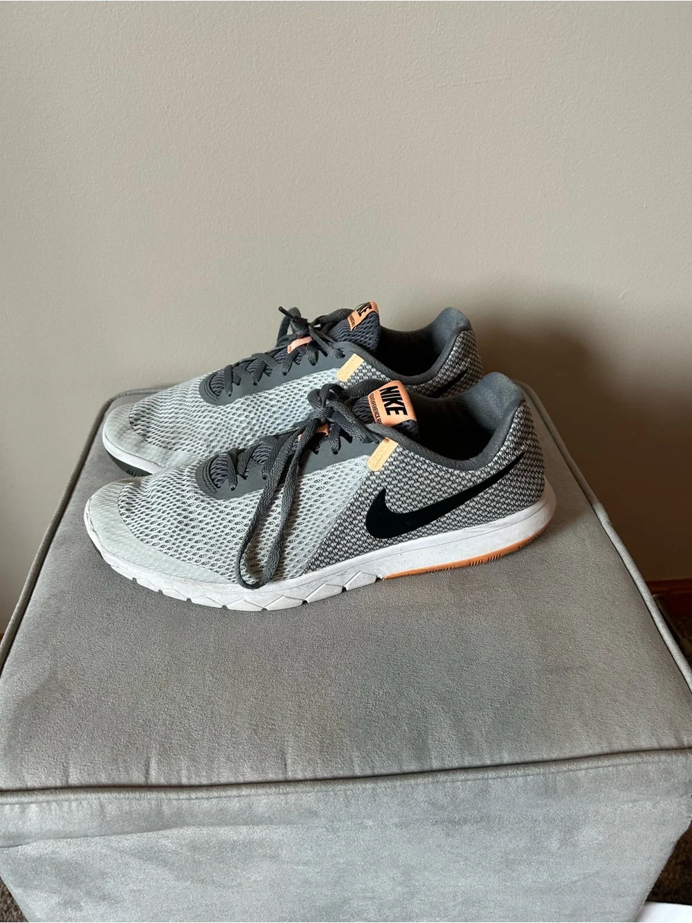 Nike women’s Gray & Black Mesh Sneakers with Orange Accents